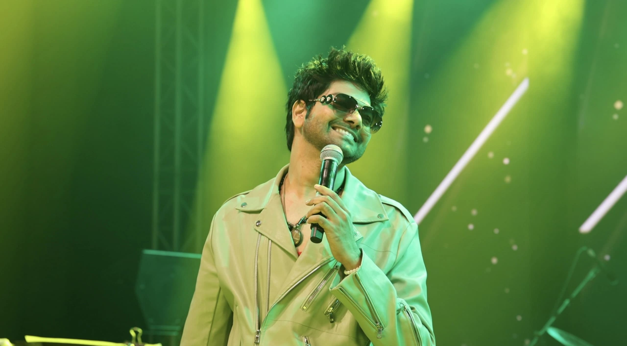 Samrat smiling on stage