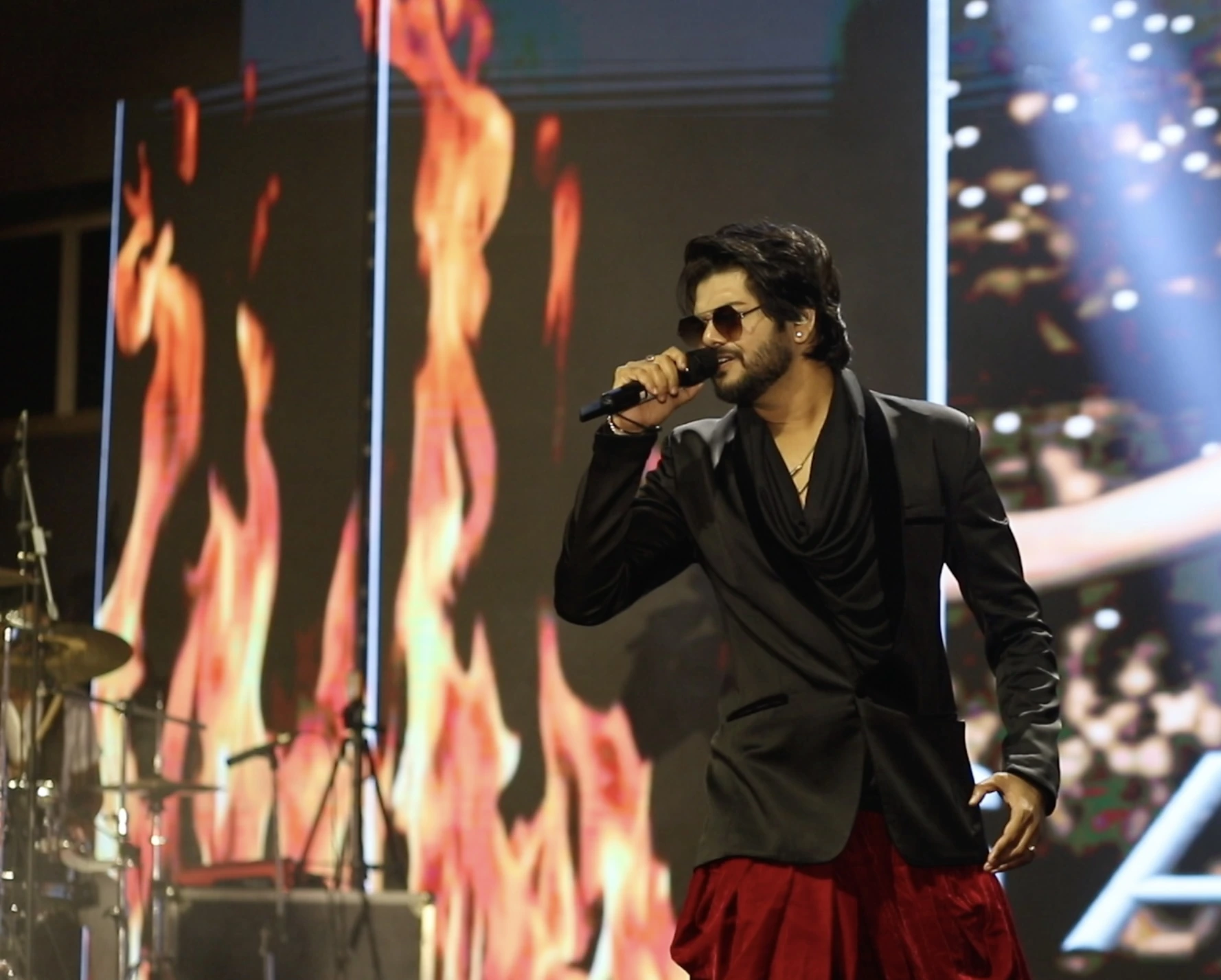 Samrat performing live on stage with fire